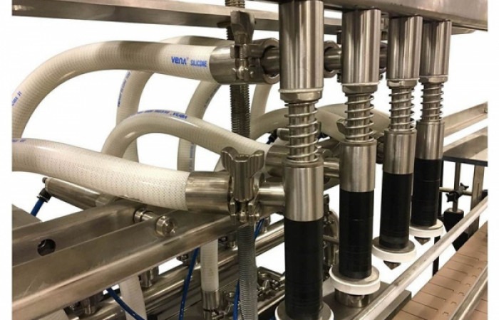 Automatic_inline_pressure_overflow_filler_machine_model_GI3300_by_Acasi_Machinery_Inc._front_and_left_view-min