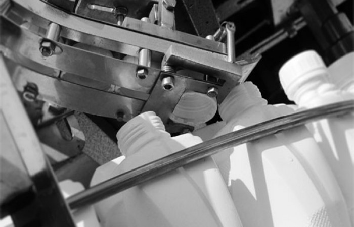 دستگاه-پرکن-و-در-بند-روتاری-مخصوص-مواد-اسیدی-و-خورنده-توان-صنعت-مشهد-رضا-نیازمند