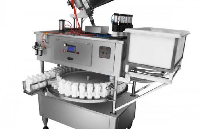 دستگاه-پرکن-و-در-بند-روتاری-مخصوص-مواد-اسیدی-و-خورنده-600x600